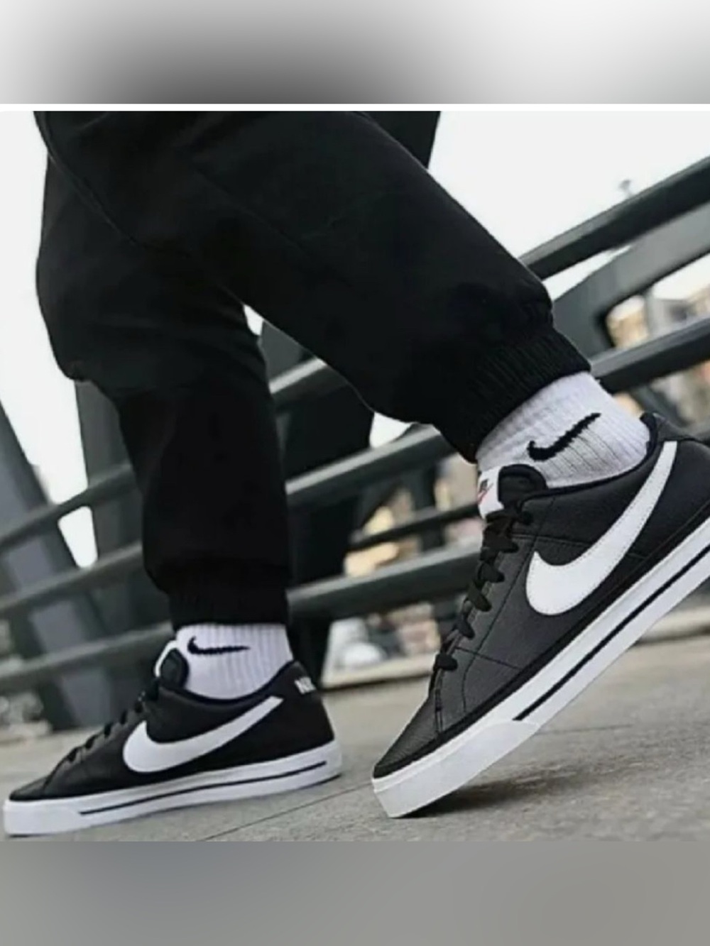 Nike Black and White Low-Top Sneakers with White Swoosh